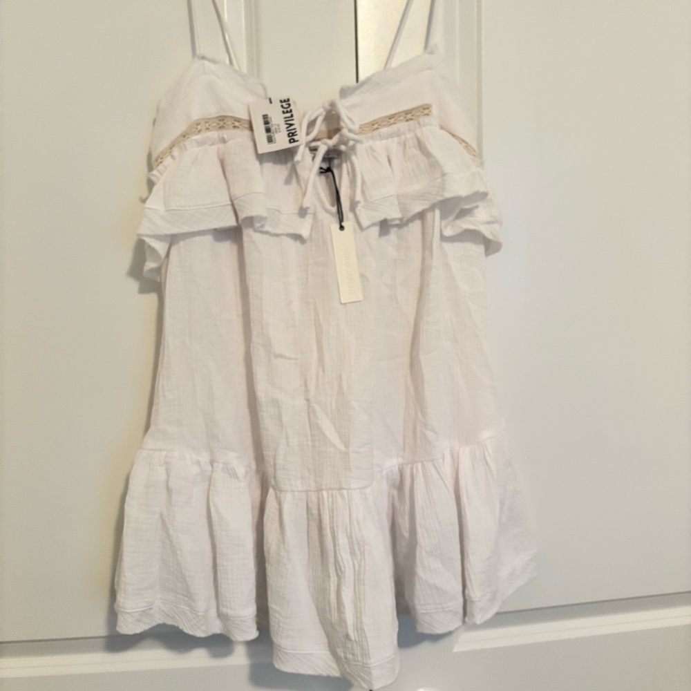 Olivaceous White Ruffle Mini Dress